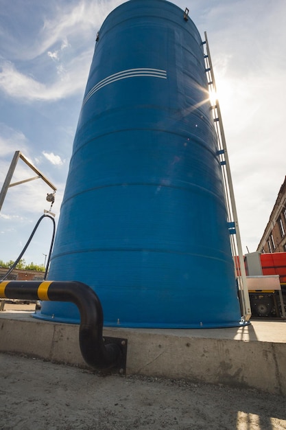 blue-water-tower-with-white-staircase-black-hose_274719-6087 blue-water-tower-with-white-staircase-black-hose_274719-6087
