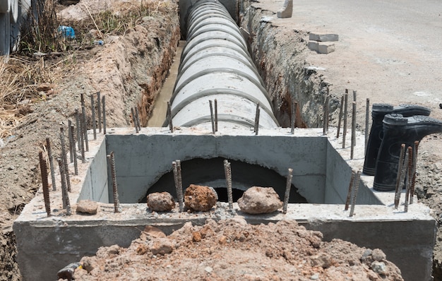 concrete-drainage-pipre-row-conctruction-work_48648-121 concrete-drainage-pipre-row-conctruction-work_48648-121