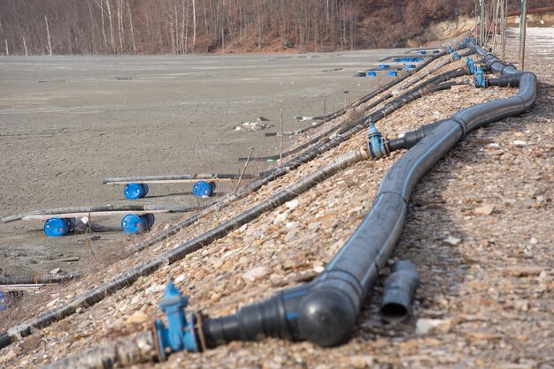 decanting-lake-pipe-installation-treatment-with-lime-purification-water-heavy-metals_1048944-27193738 decanting-lake-pipe-installation-treatment-with-lime-purification-water-heavy-metals_1048944-27193738