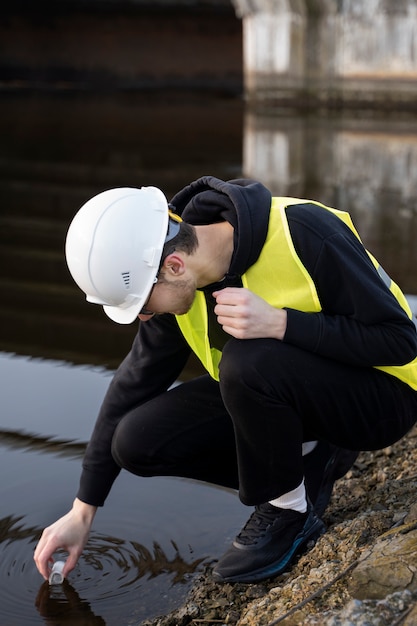 full-shot-engineer-taking-water-sample_23-2149354042 full-shot-engineer-taking-water-sample_23-2149354042