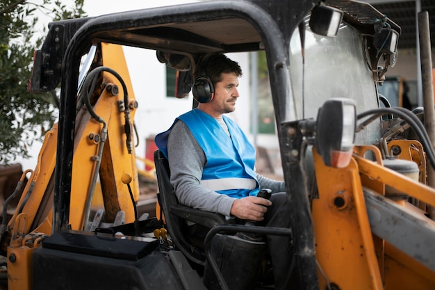 man-using-excavator-digging-day-light_23-2149194782 man-using-excavator-digging-day-light_23-2149194782