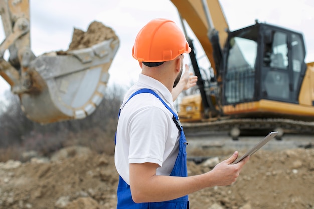 person-working-building-construction_23-2149184928 person-working-building-construction_23-2149184928