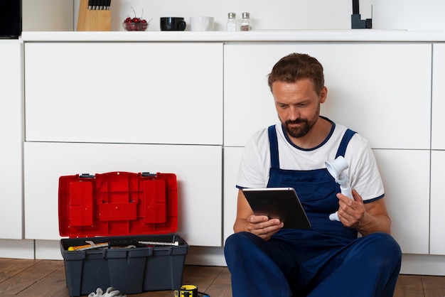 plumbing-professional-doing-his-job_23-2150721550 plumbing-professional-doing-his-job_23-2150721550