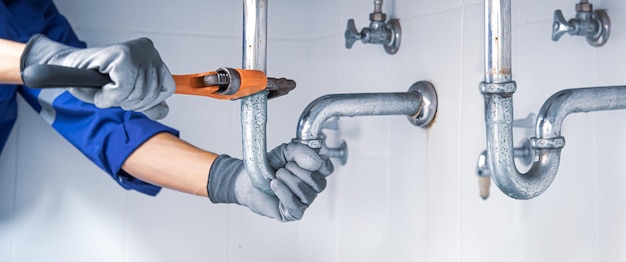 technician-plumber-using-wrench-repair-water-pipe-sink_101448-4142 technician-plumber-using-wrench-repair-water-pipe-sink_101448-4142